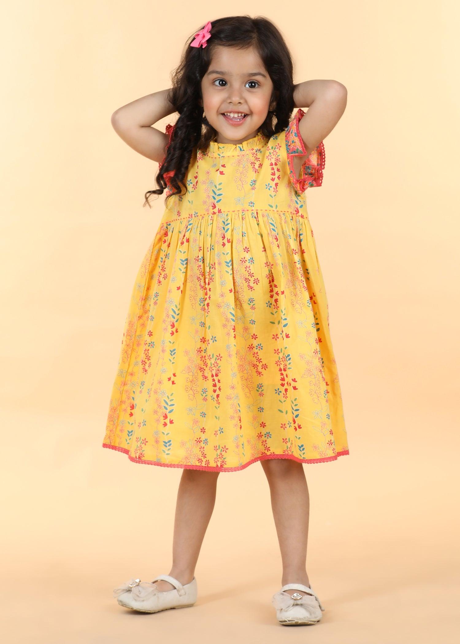 Yellow Cotton Takshita Dress Girls (6 Months -12 Yrs) Ratan Texprocess Pvt. Ltd