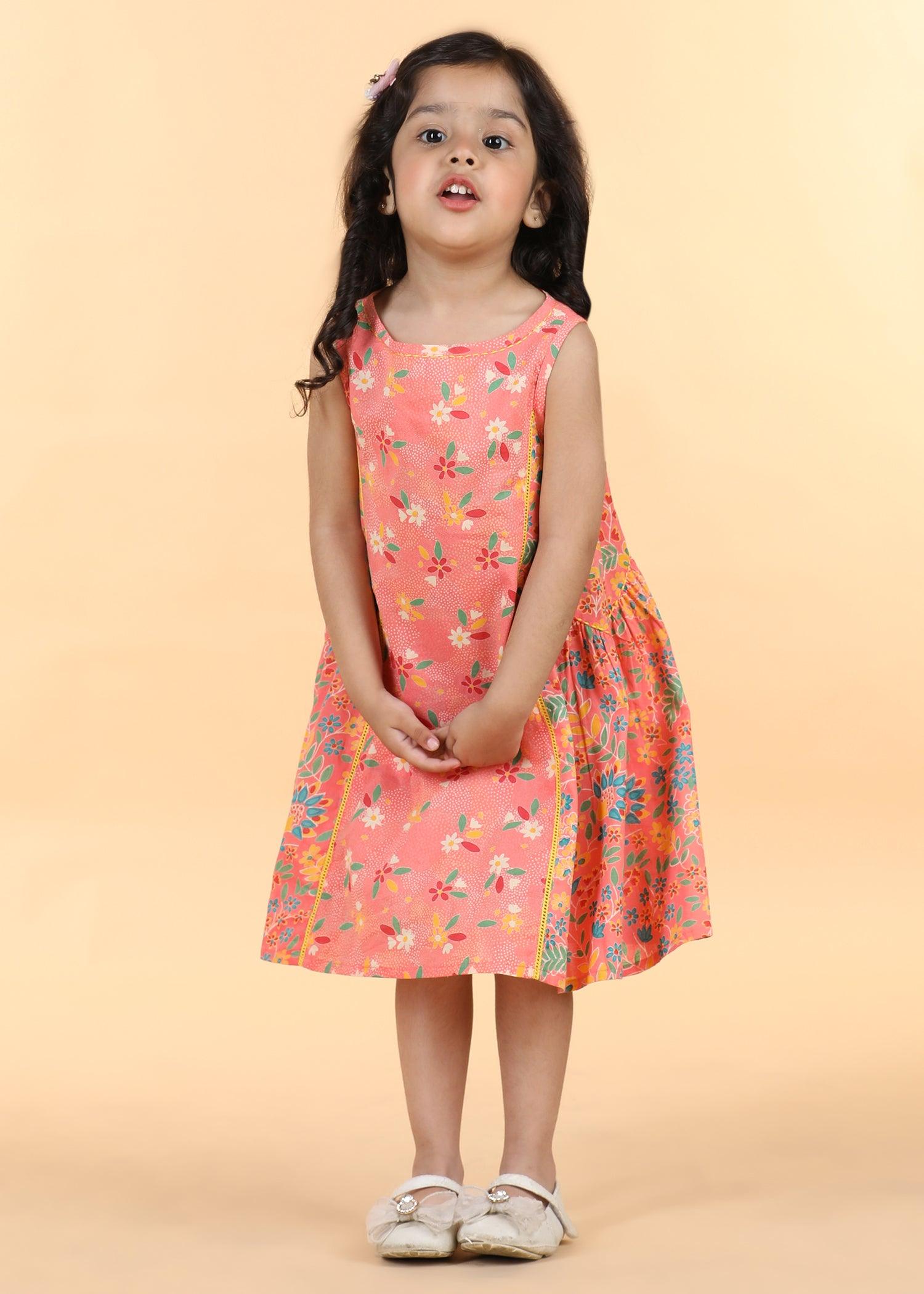 Peach Cotton Panelled Dress Girls (6 Months -12 Yrs) Ratan Texprocess Pvt. Ltd