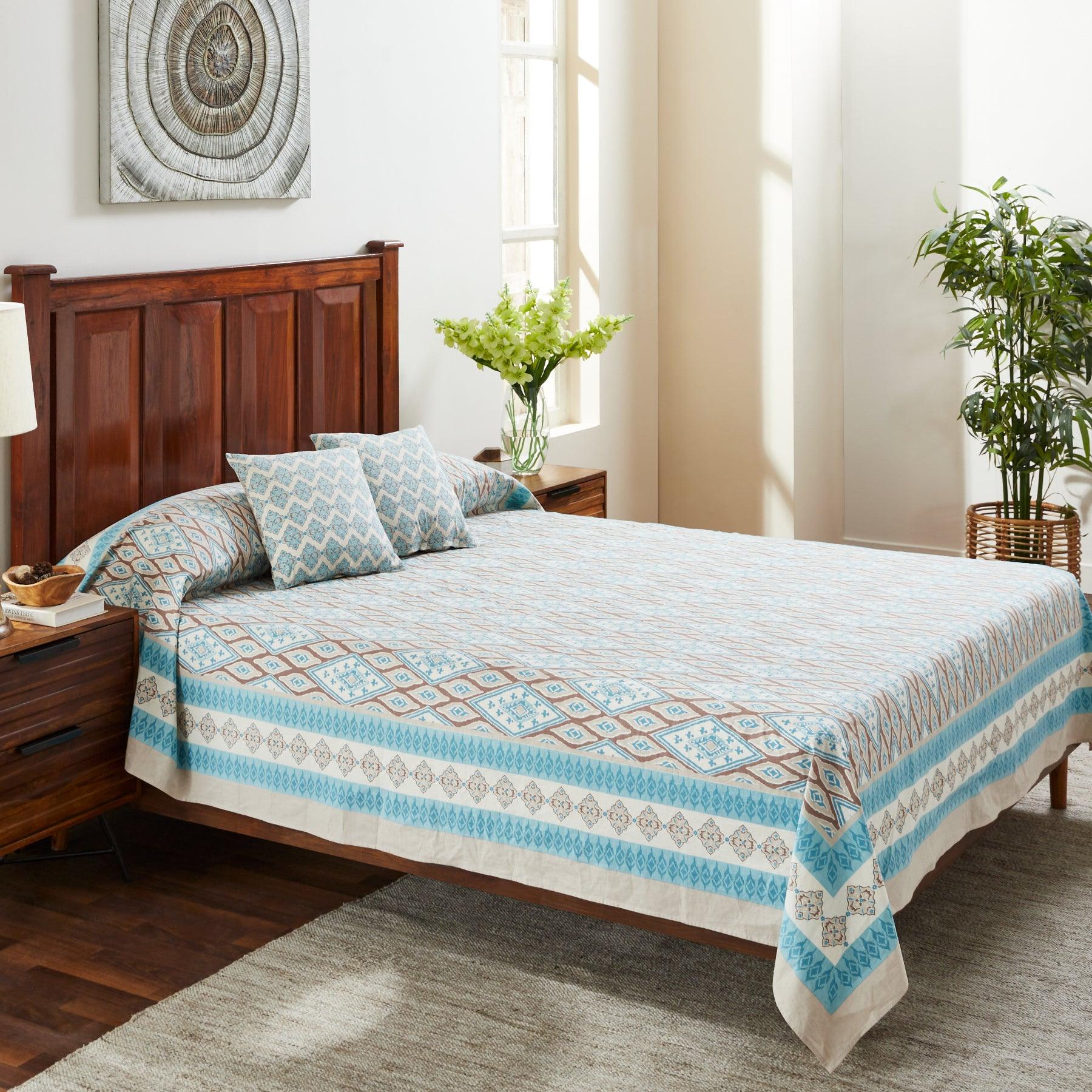 Uzbek Ikat Turquoise Brown Hand Block Printed Cotton Bedcover Ratan Texprocess Pvt. Ltd