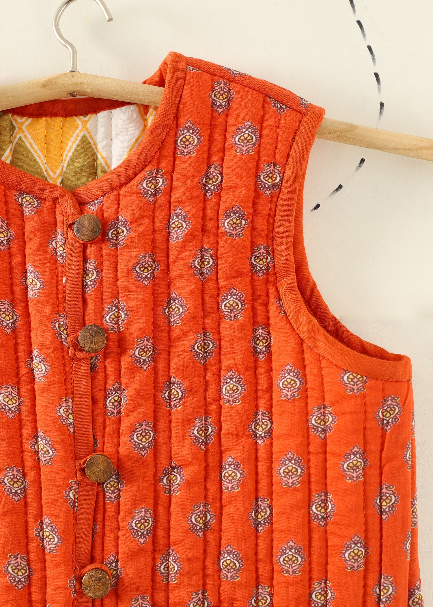 Orange Rhombus Quilted Cotton Reversible Bundi Jacket Unisex (1-7 Years) Ratan Texprocess Pvt. Ltd