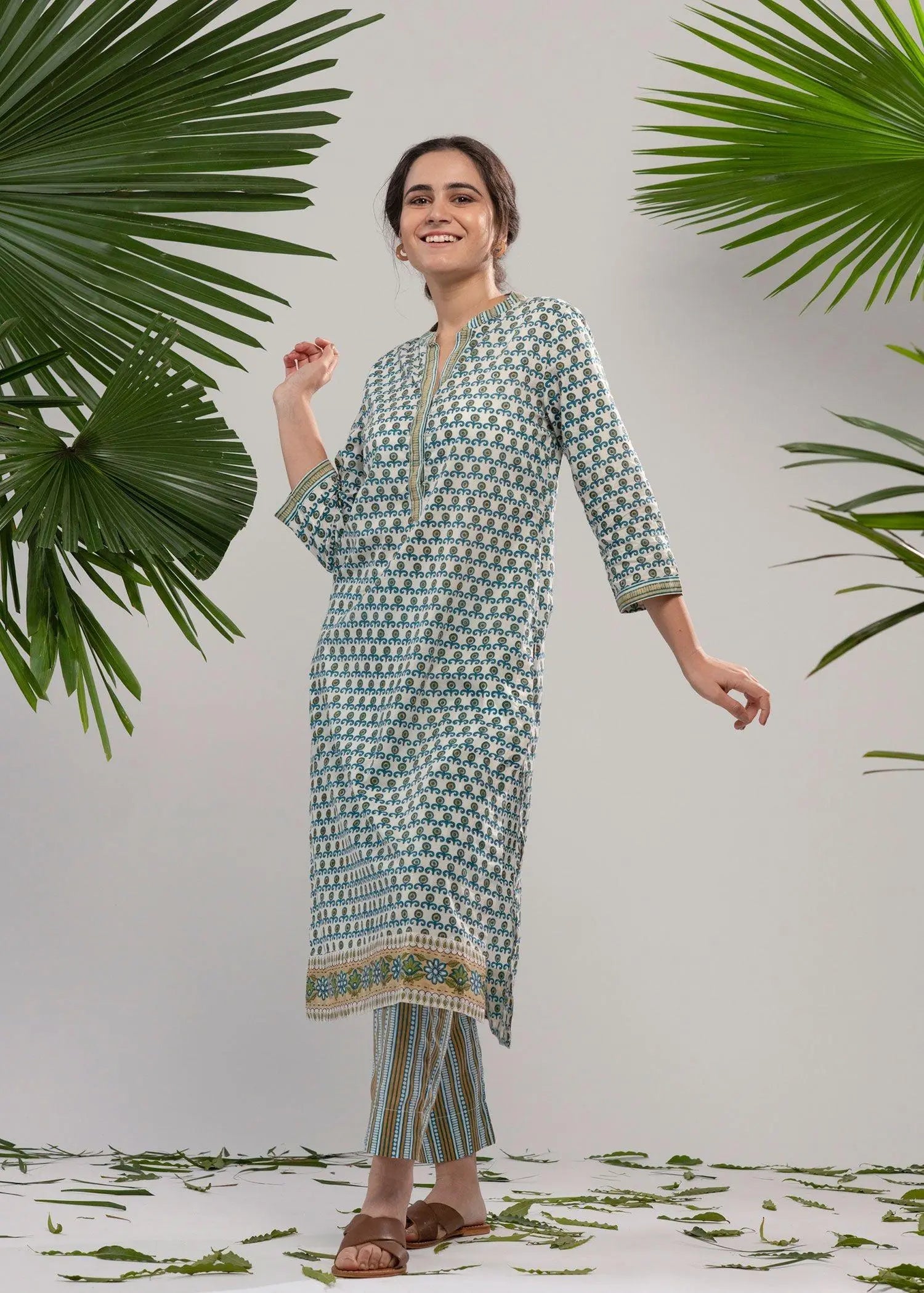 Smriti Teal Floral Straight Fit Calf Length Cotton Kurta